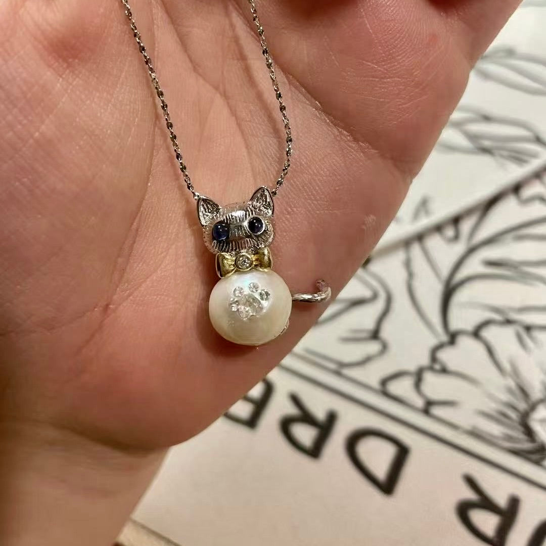 【Pearlish】Kitty Edison Pendant · Handcrafted jewelry featuring a pure natural freshwater baroque pearl, set in an S925 sterling silver base. A niche artisanal collectible, an excellent gift choice.