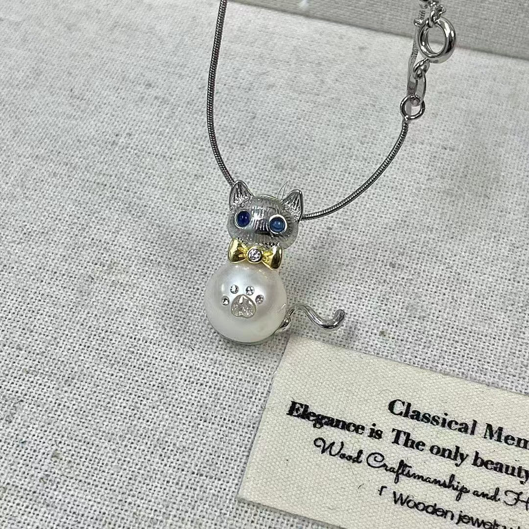 【Pearlish】Kitty Edison Pendant · Handcrafted jewelry featuring a pure natural freshwater baroque pearl, set in an S925 sterling silver base. A niche artisanal collectible, an excellent gift choice.